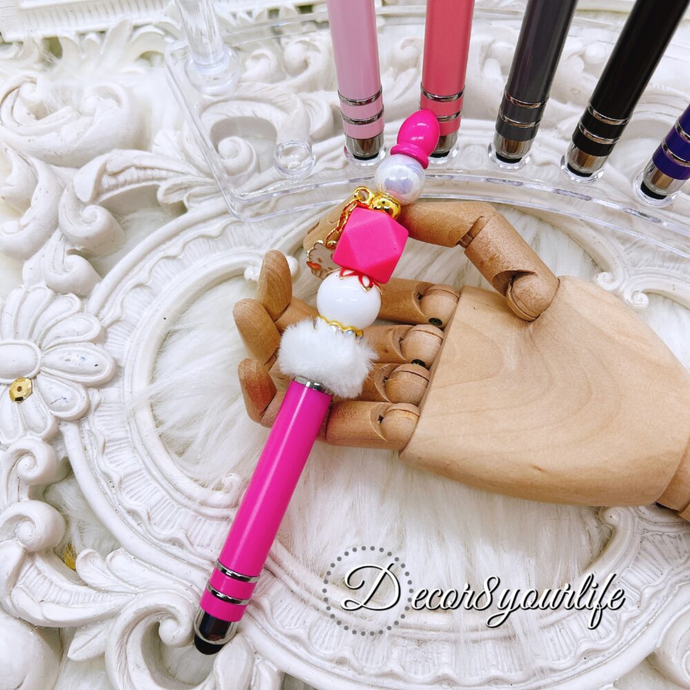 Hello Kitty Beaded Stylus Pens with faux fur poms in assorted colors, featuring licensed Sanrio Hello Kitty charms and colorful beads.