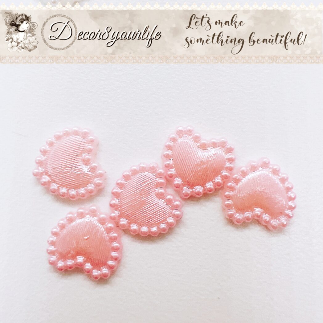 Flat-back mini heart acrylic embellishments set for DIY crafts in pink, white, and cream – perfect for scrapbooking and card-making.