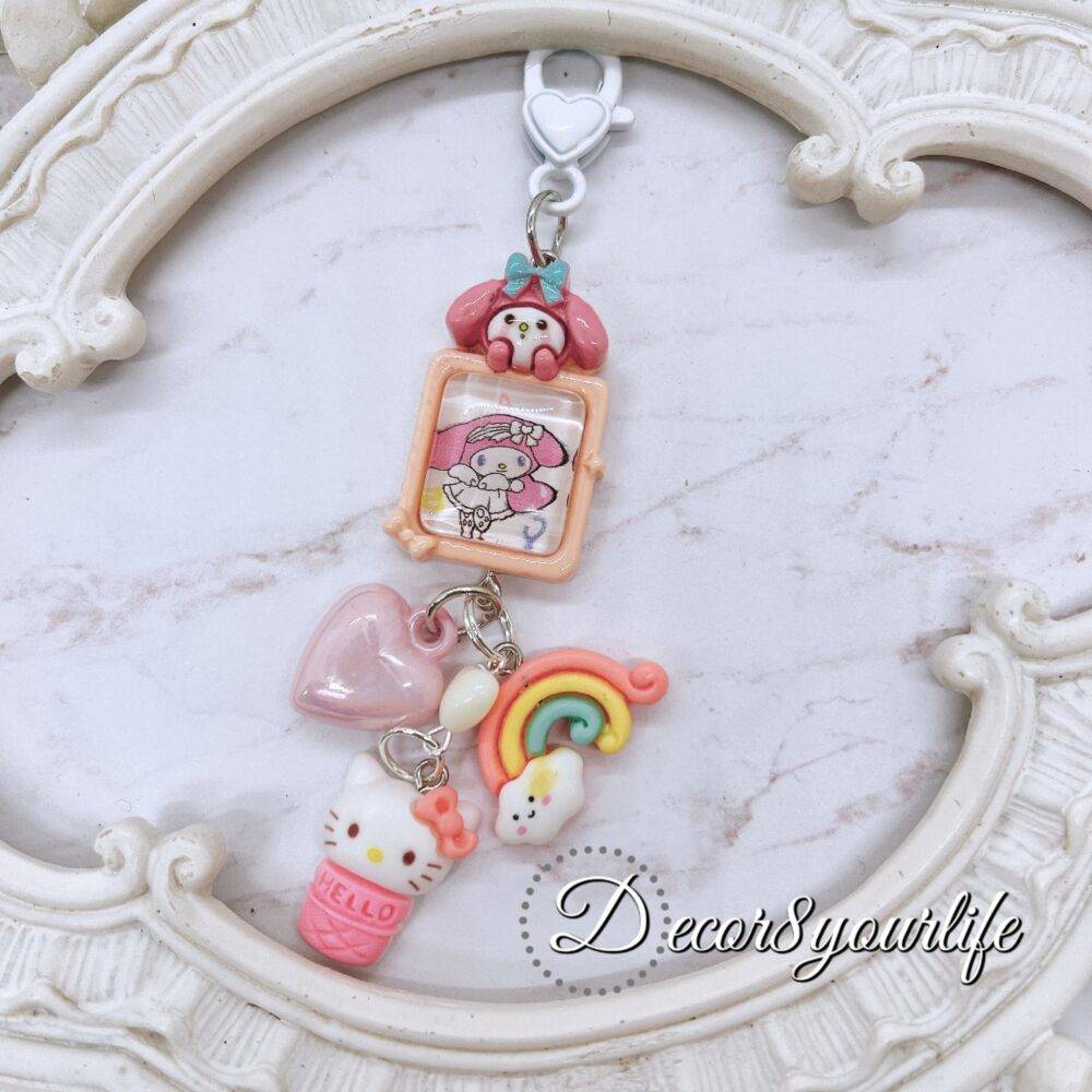 Handmade Hello Kitty key chain in candy colors with licensed Sanrio characters and cute charms for gift giving