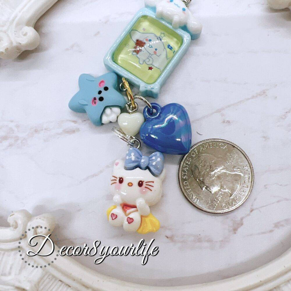 Handmade Hello Kitty key chain in candy colors with licensed Sanrio characters and cute charms for gift giving