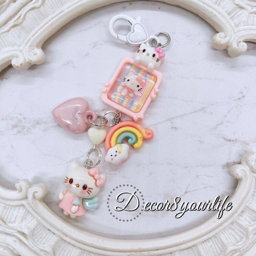 Handmade Hello Kitty key chain in candy colors with licensed Sanrio characters and cute charms for gift giving