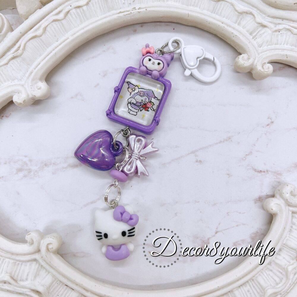 Handmade Hello Kitty key chain in pastel candy colors featuring Sanrio characters, perfect stocking stuffer or gift for friends