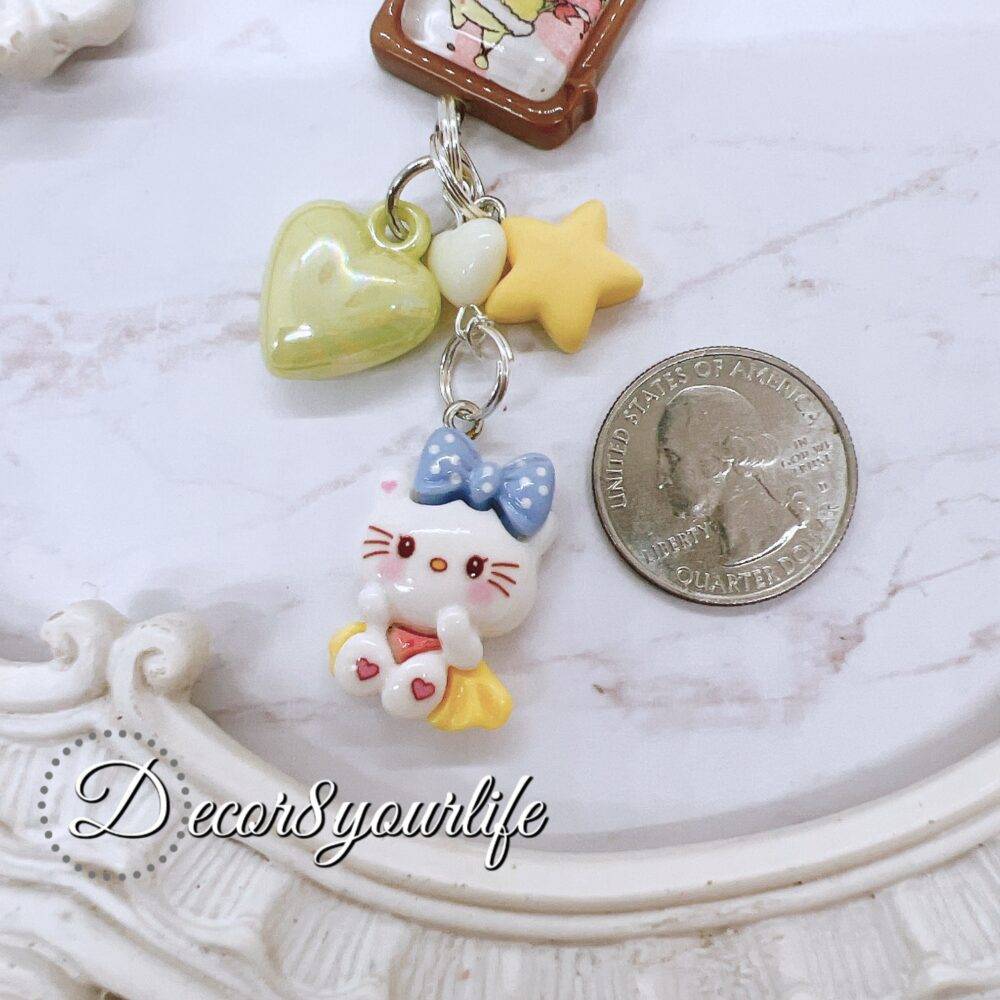 Handmade Hello Kitty key chain in pastel candy colors featuring Sanrio characters, perfect stocking stuffer or gift for friends