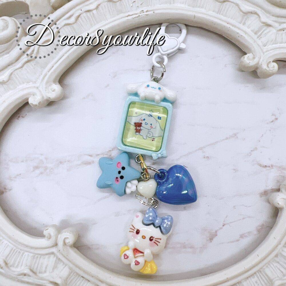 Handmade Hello Kitty key chain in candy colors with licensed Sanrio characters and cute charms for gift giving