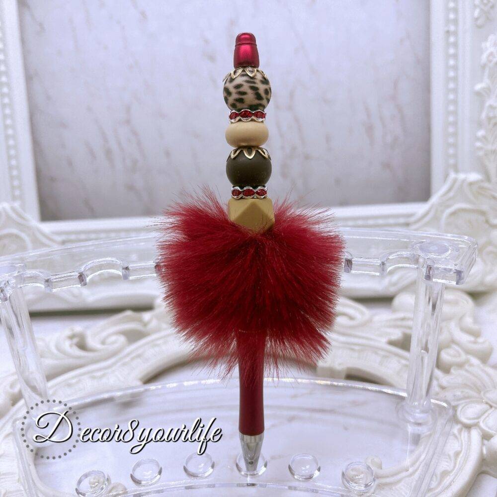 Elegant Leopard Print Red Beaded Pen with Faux Fur on a white display stand, featuring red beads, leopard-print detail, and gold-tone accents.