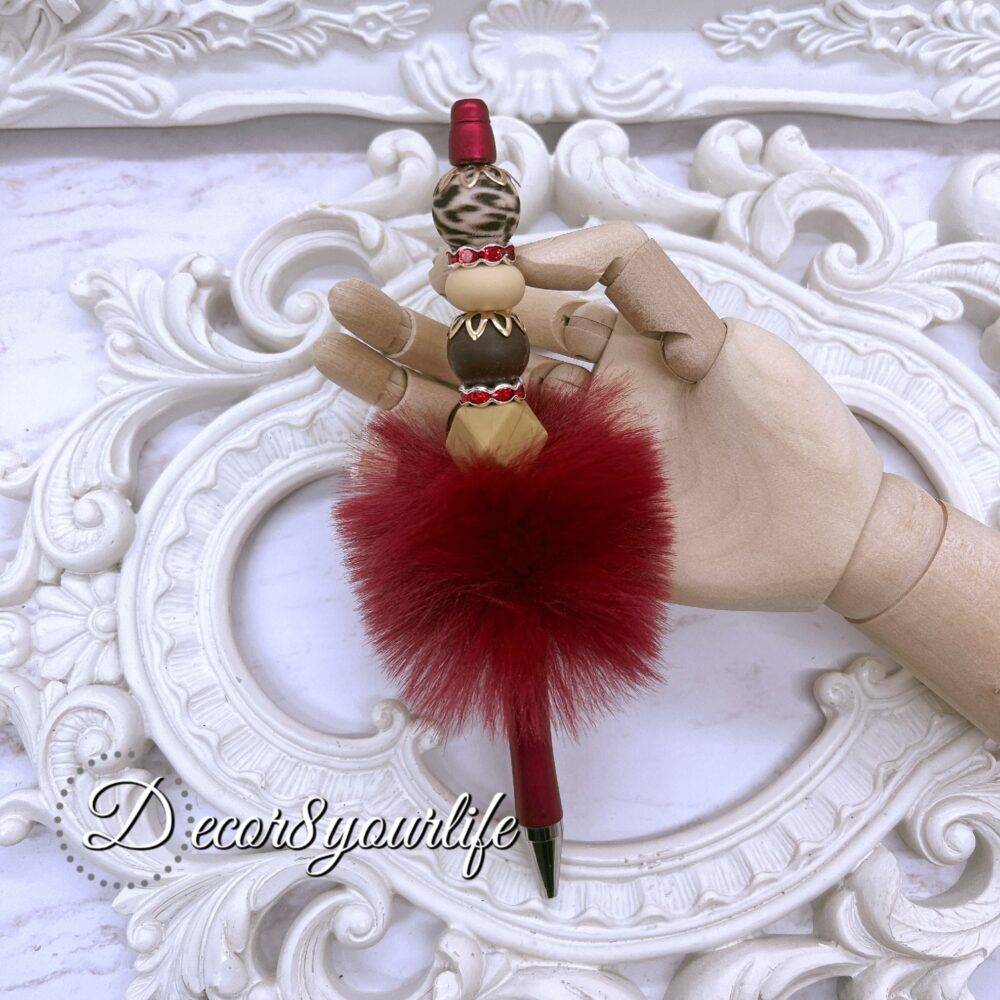 Elegant Leopard Print Red Beaded Pen with Faux Fur on a white display stand, featuring red beads, leopard-print detail, and gold-tone accents.