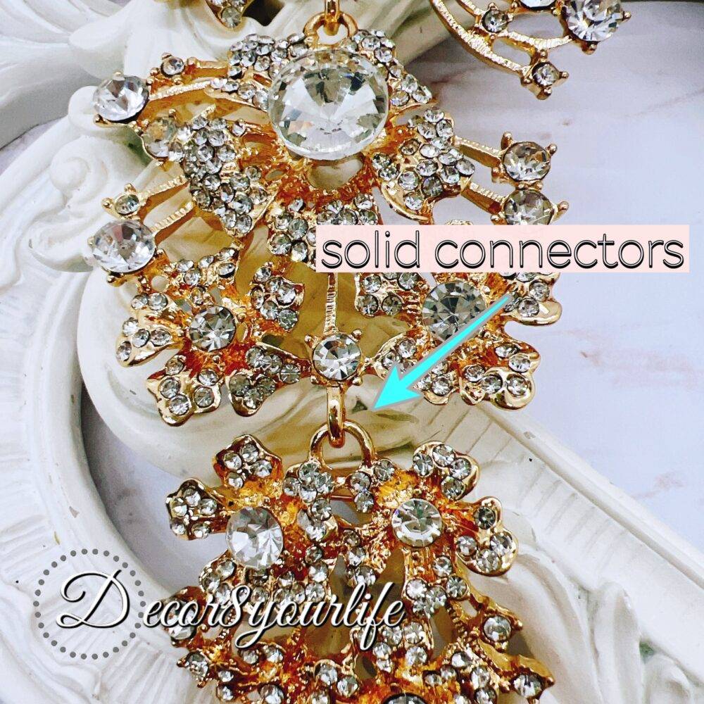 Extra-large gold cascading bridal brooch with rhinestones for DIY wedding decor and craft projects.