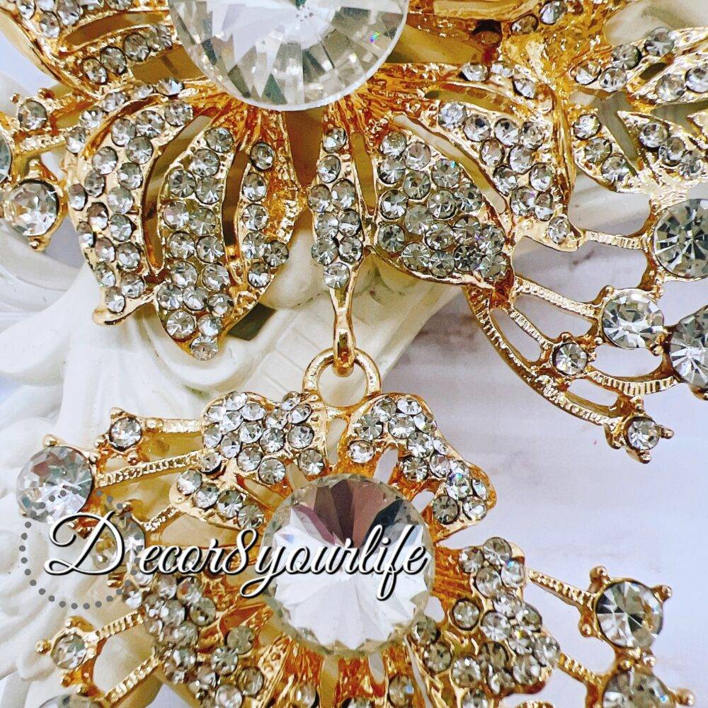 Extra-large gold cascading bridal brooch with rhinestones for DIY wedding decor and craft projects.