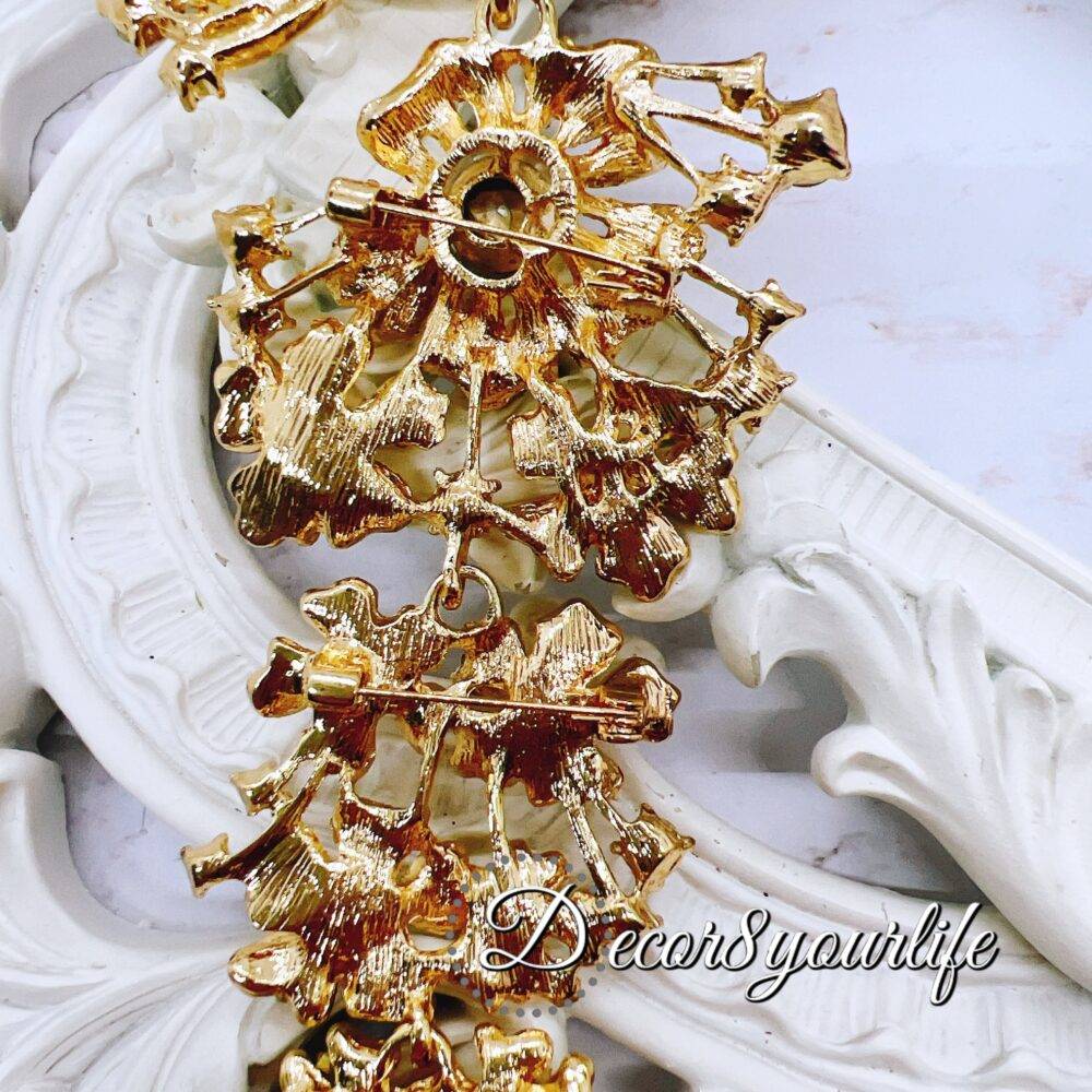 Extra-large gold cascading bridal brooch with rhinestones for DIY wedding decor and craft projects.