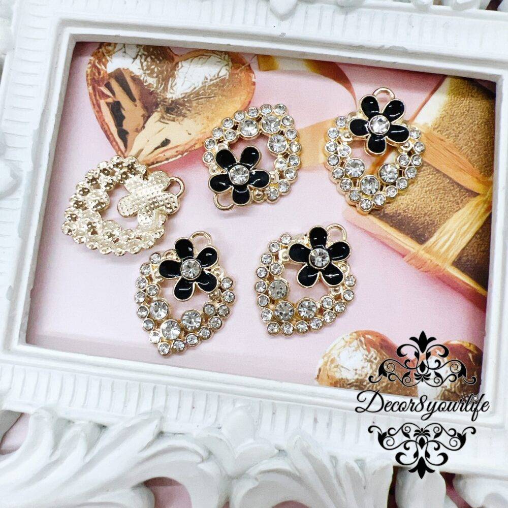 Rhinestone heart charm with black enamel flower, for jewelry making diy crafts.