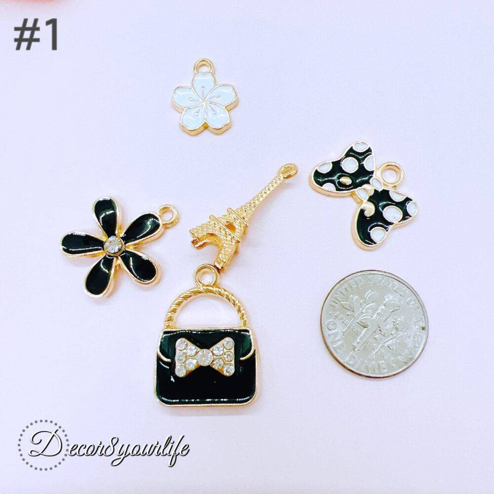 Dressy Charms Grab Bag. Elegant fashion-themed enamel charms in black, red, and gold. Each grab bag contains five unique charms for jewelry making, crafting, and DIY accessories.