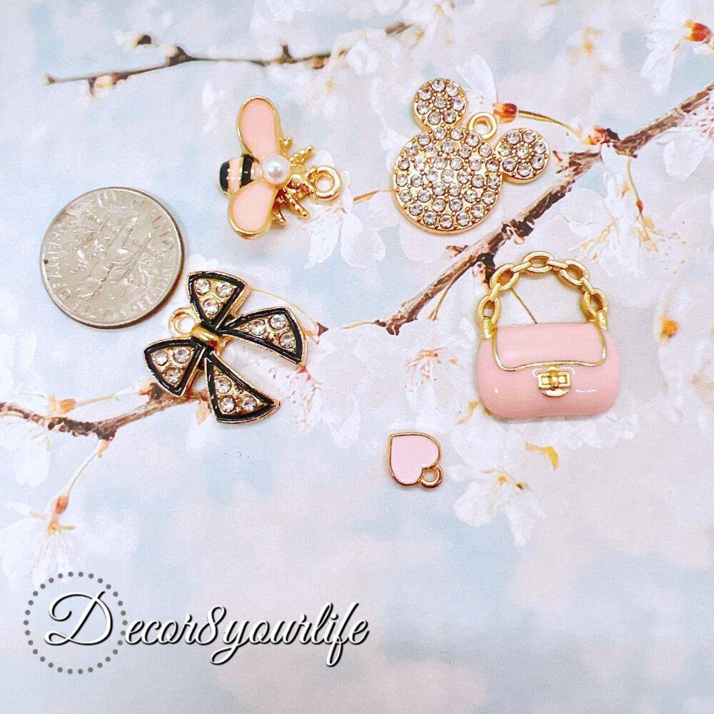 Explore our Elegant Pink and White Charm Grab Bags, each offering a unique assortment of high-quality charms perfect for DIY jewelry, scrapbooking, and more.