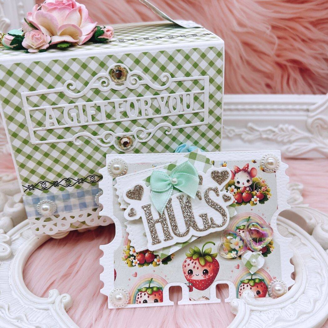 Handmade memdex box album featuring layered and embellished memorydex cards using gingham and strawberry-themed paper from the 'Tasty Treats by Decor8yourlife' collection. Cards are decorated with ribbon bows, pearls, and die-cut shapes.