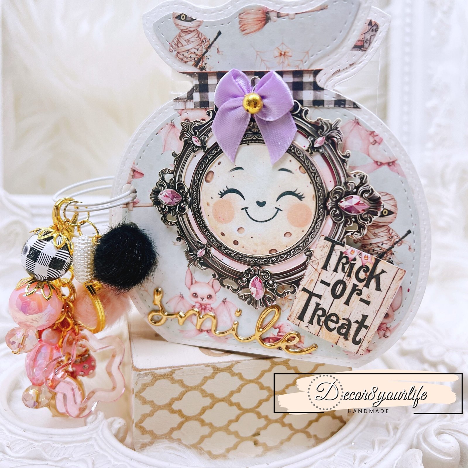 DIY Halloween embellishment book and mini album made with Summerween scrapbook paper, metal dies, and charm dangle by Decor8yourlife