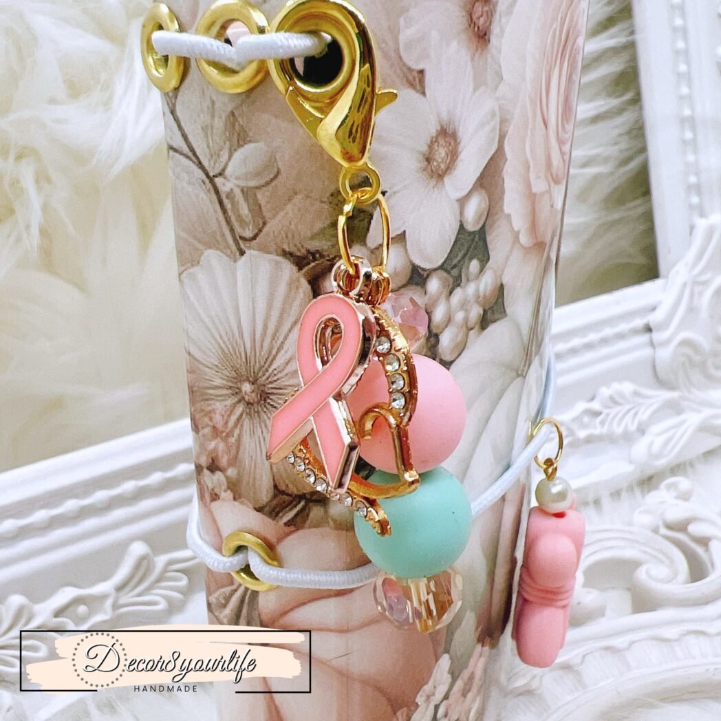 Handmade pocket-size traveler’s notebook with ephemera, altered notebooks, beaded pen, and removable charms.