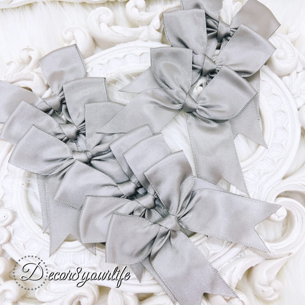 Gray satin bows for diy crafts, scrapbook embellishments, wedding albums, hair accessories and other home decor projects.