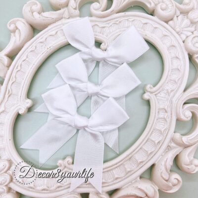 White handmade satin bows for diy crafts, home decor, party invitations, wedding crafts, and hair bows.