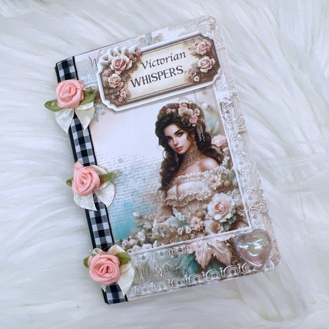 Victorian Whispers Pocket Journal - Shabby chic altered mini composition notebooks with gingham spines, floral ephemera, bows, and vintage plaques—pocket journals measuring 4.5 x 3.25 inches, 160 pages.