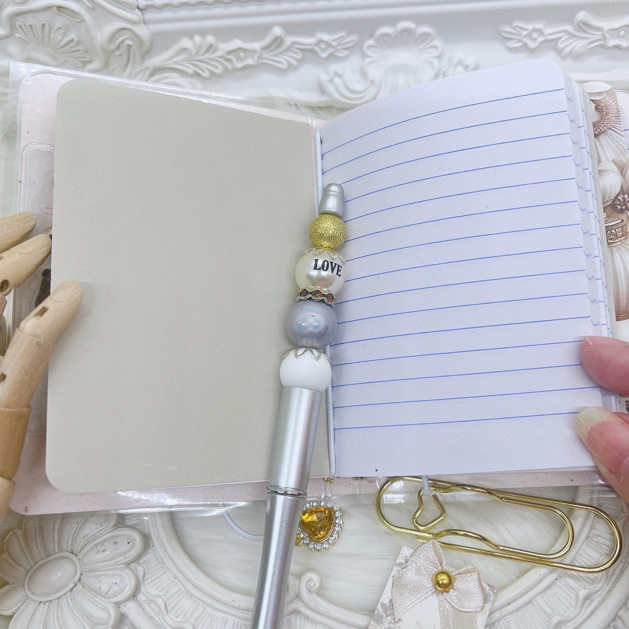 Vintage perfume bottle themed laminated traveler's notebook, blush pink, Victorian style, includes die-cut ephemera and beaded pen