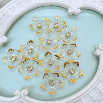 Clear acrylic flower with gold trim and rhinestone center. Embellishments for DIY Crafts. Craft supplies store Decor8yourlife.