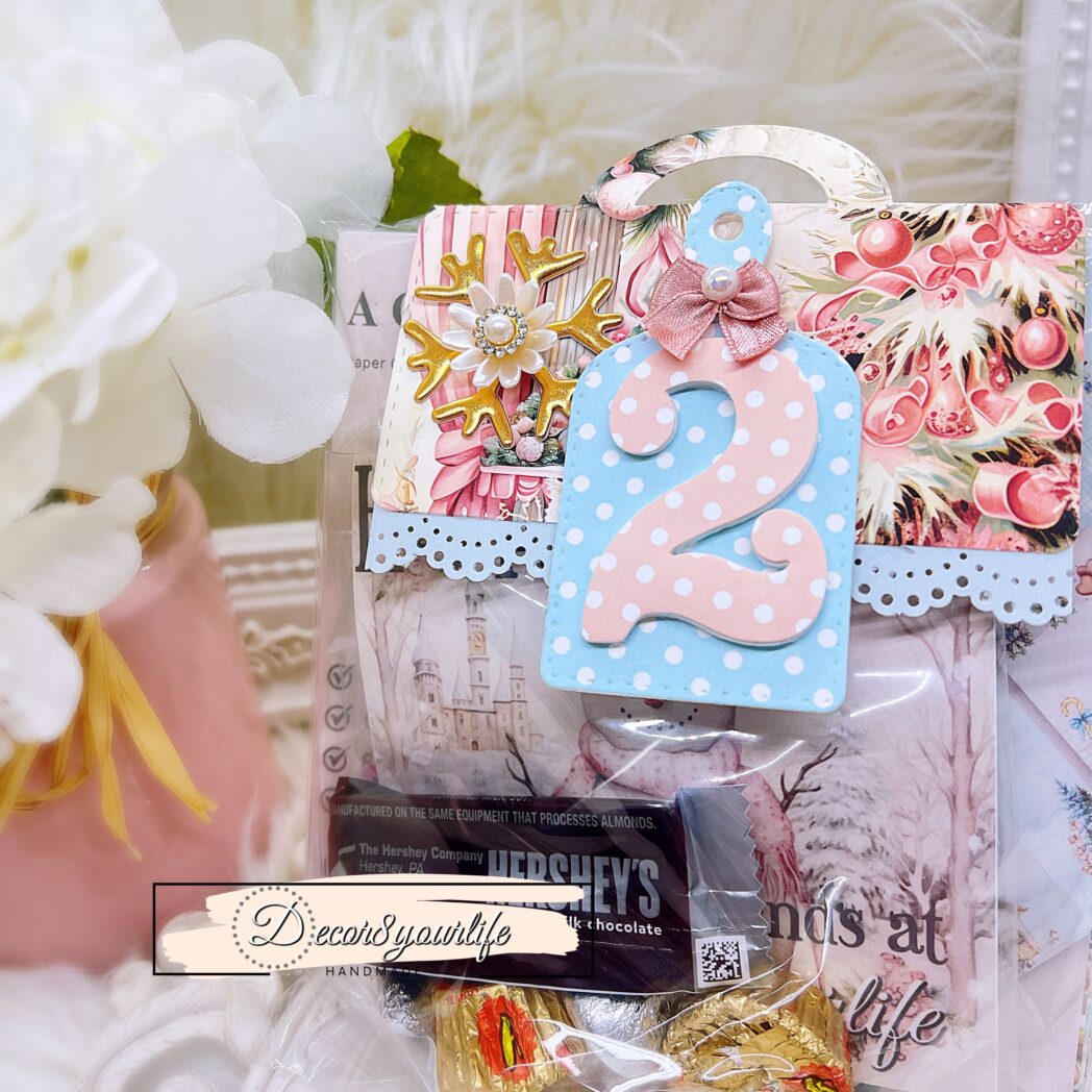 DIY Christmas treat bags decorated with number tags and holiday embellishments, perfect for gifting or holiday crafts.