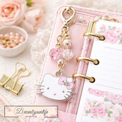 This officially licensed Sanrio Hello Kitty charm set is perfect for adding a sweet, nostalgic touch to your creative projects. Each pack includes six silver tone charms in a coordinated pink theme.