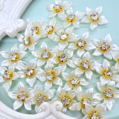 White flower cabochon embellishment with rhinestone center. You may use these craft embellishments in shabby chic projects, mini albums, card making, journals, scrapbooks and diy bridal crafts.