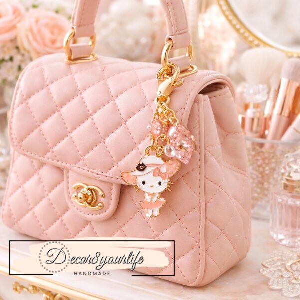 Hello Kitty enamel charms. Each charm measures approximately 3/4 inch and features beautiful pastel enamel on a gold-tone metal base. These officially licensed Sanrio charms are perfect for beaded pens, jewelry making, keychains, planner charms, zipper pulls, phone charms, scrapbooking, and all kinds of kawaii craft projects.