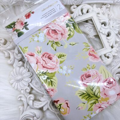 A rare Webster’s Pages traveler’s notebook insert set featuring one floral lined notebook and one striped grid notebook. Standard TN size (4.25 x 8.25 inches).