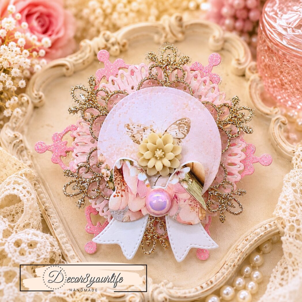 Handmade layered paper rosette embellishment created with circle dies, decorative frame dies, glitter cardstock, watercolor paper, and papers from the Honey Bees & Summer Breeze scrapbook collection by Decor8yourlife.