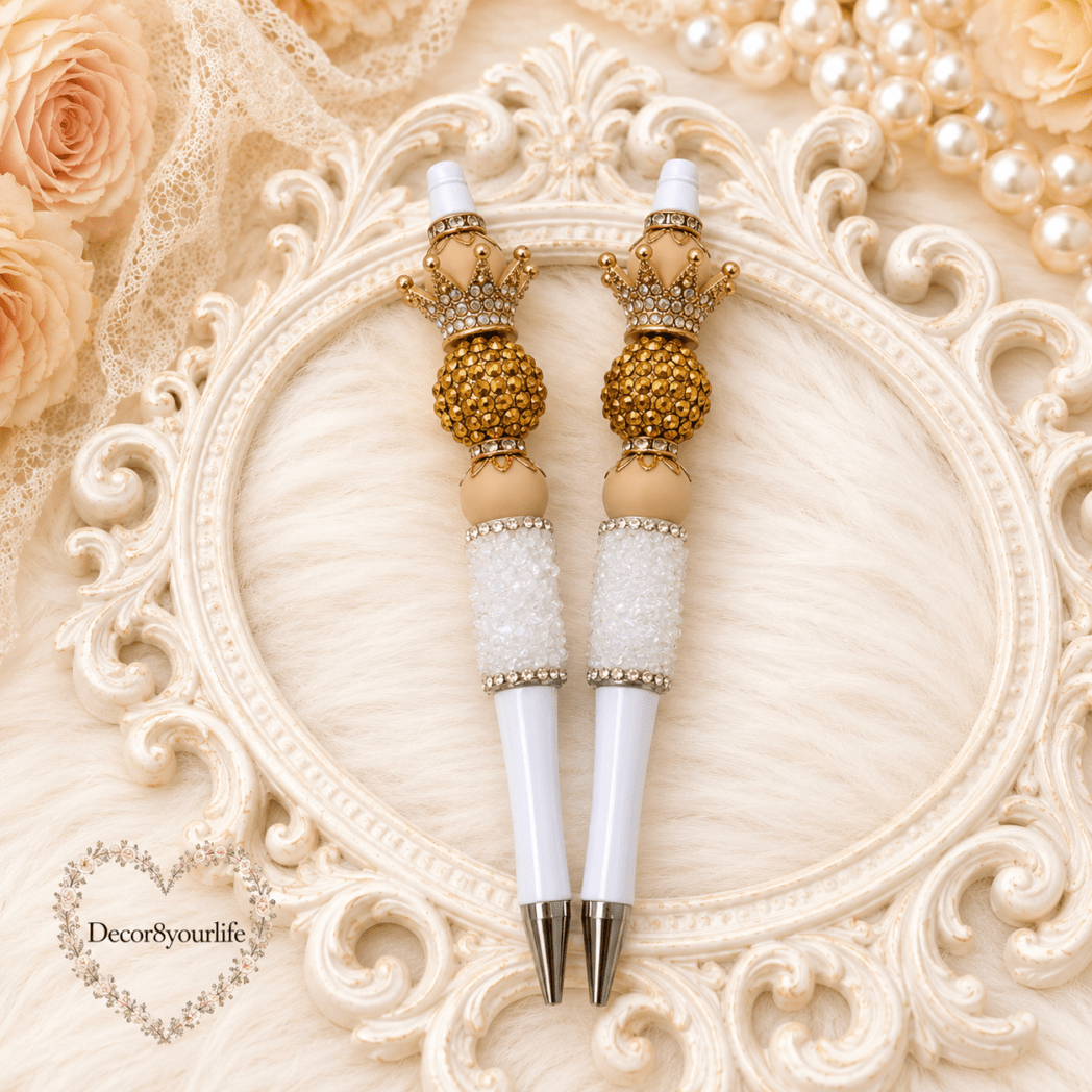Elegant handcrafted beaded gift pens with champagne crystal beads, ivory pearl accents, gold jeweled crowns, and luxury feminine stationery by Decor8yourlife.