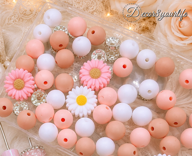 rhinestone spacer beads and silicone beads.