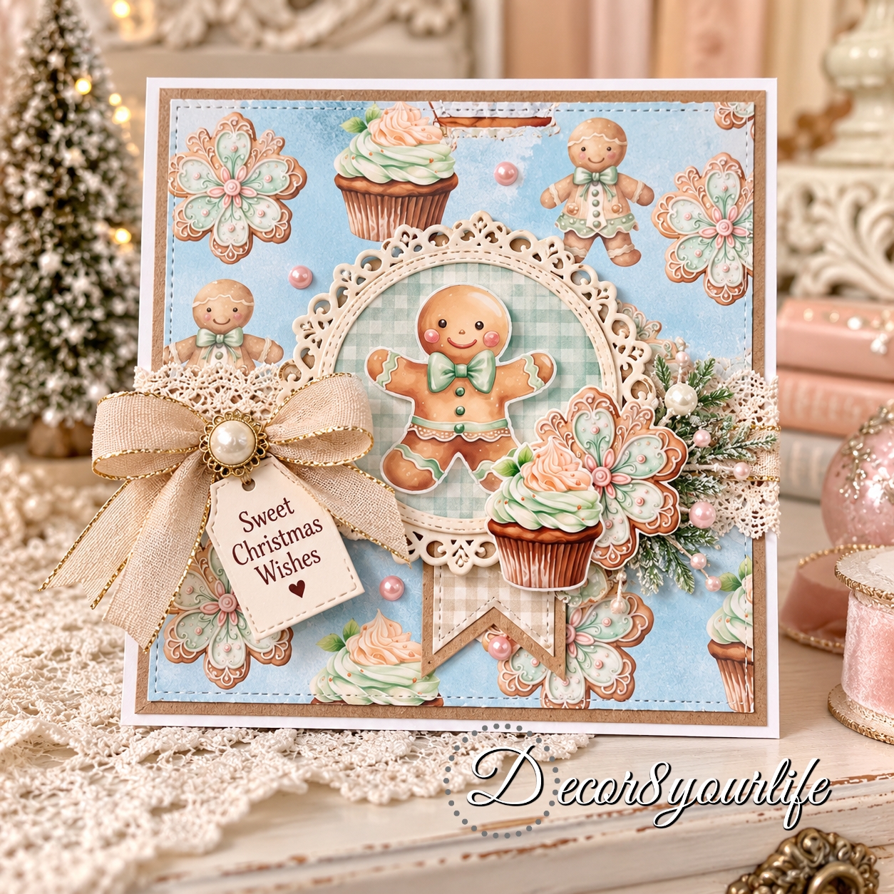 Handmade Christmas card created with A Gingerbread Christmas scrapbook paper by Decor8yourlife, featuring a gingerbread man, cupcakes, decorated cookies, lace, ribbon, pearls and a soft pastel holiday design.